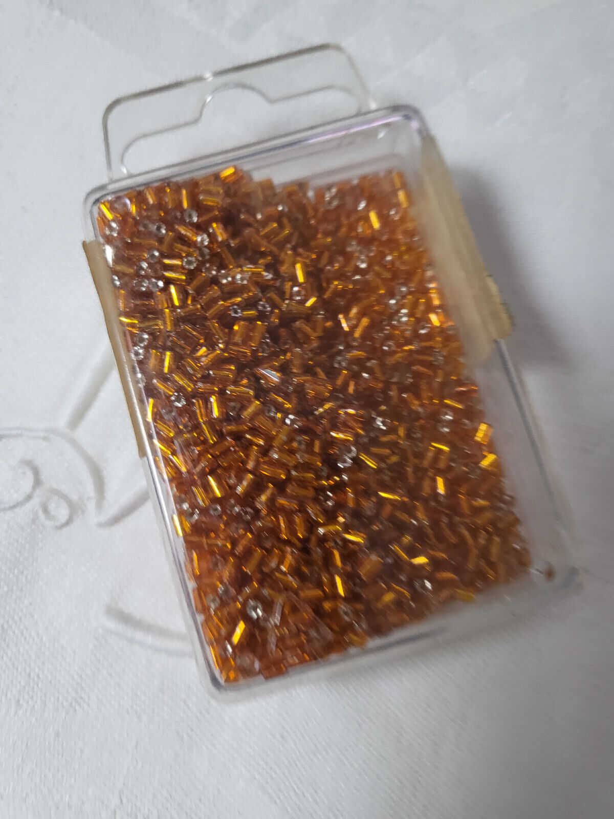 Lot 35 grammes de perles petit tube orange n°110 mercerie broderie Lunéville