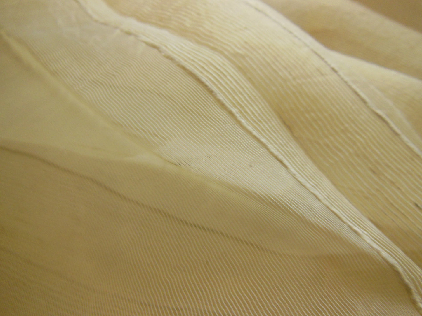 Coupon tissu moderne voilage crème motif relief 92 cm sur 1 m 06 B6