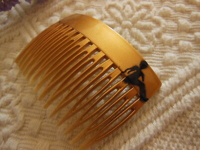 Ancien peigne vintage doré motif noir  combs jamais utilisé 