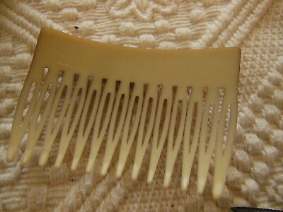 Ancien peigne vintage doré motif noir  combs jamais utilisé 