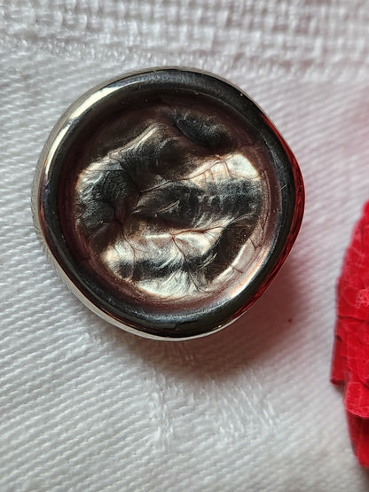 Bouton vintage en verre gris metalisé 2,6 cm pied D18I