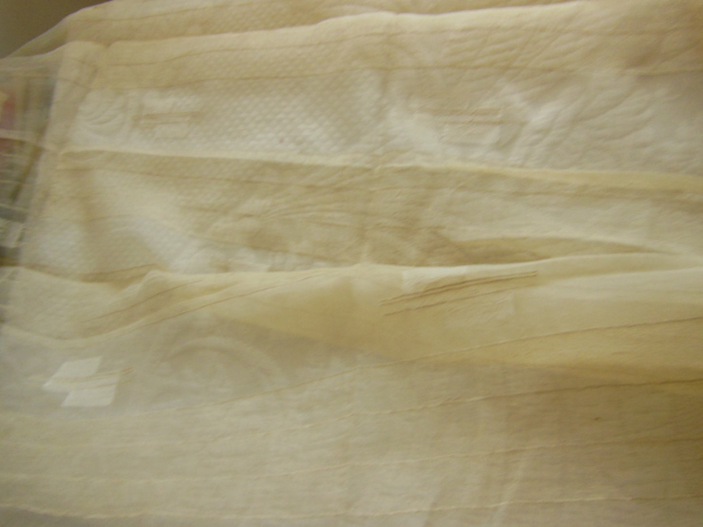 Coupon tissu moderne voilage crème motif relief  92 cm sur 1 m 06 B6