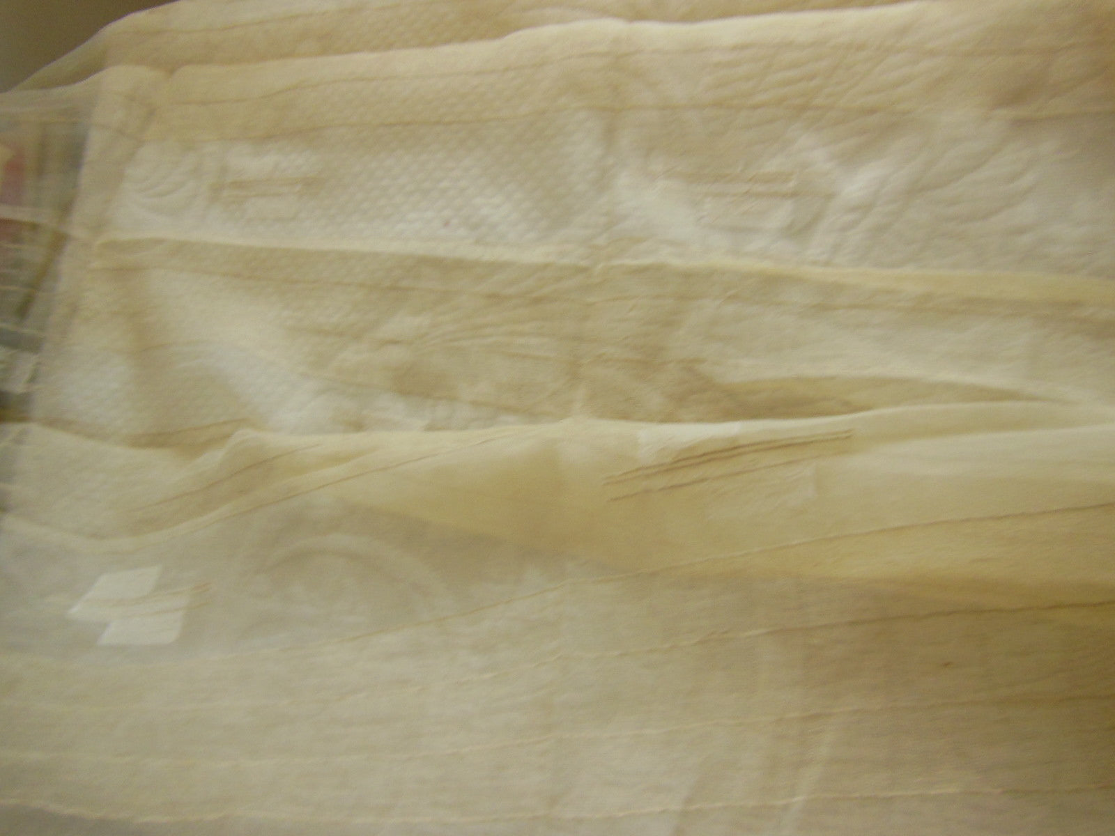 Coupon tissu moderne voilage crème motif relief  92 cm sur 1 m 06 B6