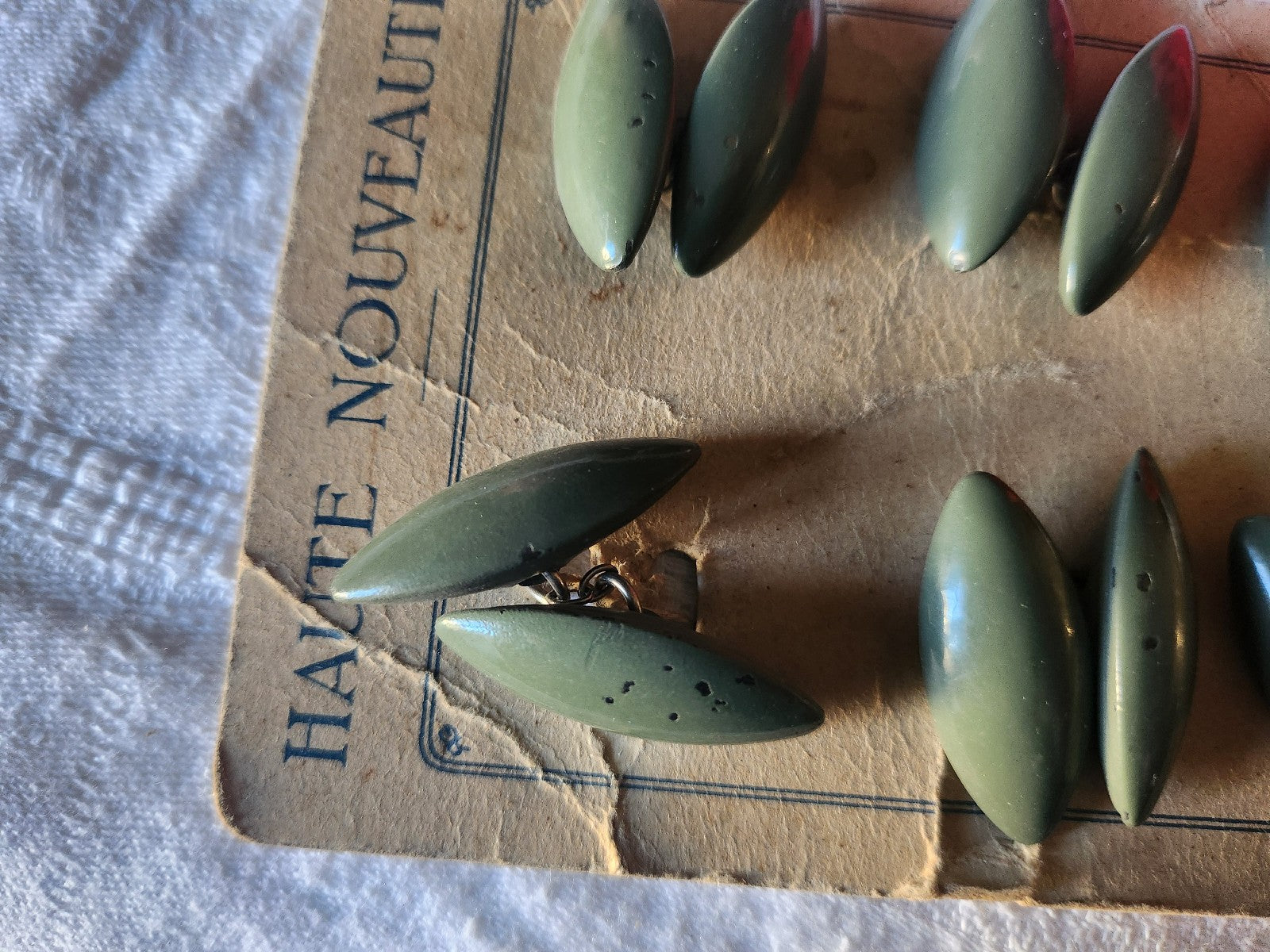 Plaque de boutons manchette vert kaki metal tel que ou à separer