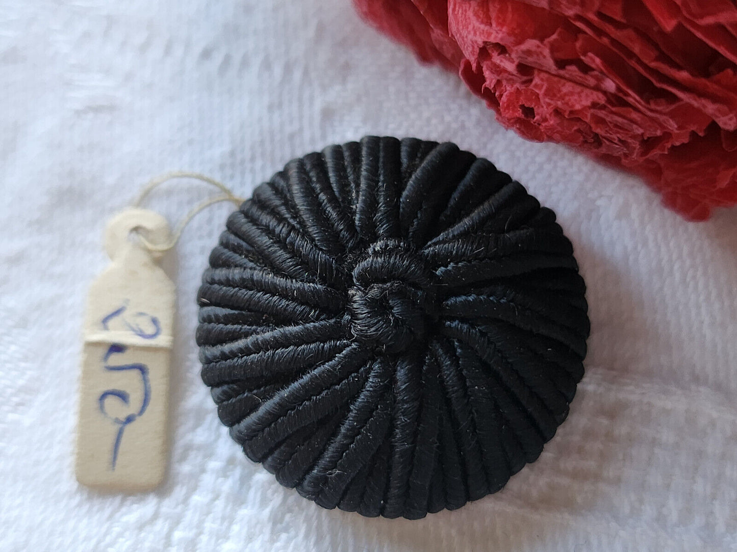 Ancien bouton en passementerie noir 2,7 cm pied D12N