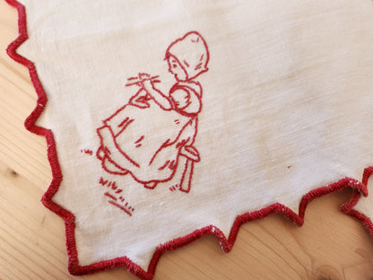 Deux napperons anciens "petite fille qui brode" rouge blanc  B8