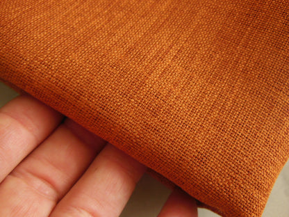 Coupon tissu trame apparente orange brulé rouille 1 m07  sur  87 cm