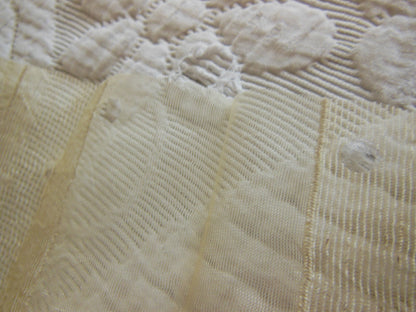 Coupon tissu moderne voilage crème motif relief  92 cm sur 1 m 06 B6