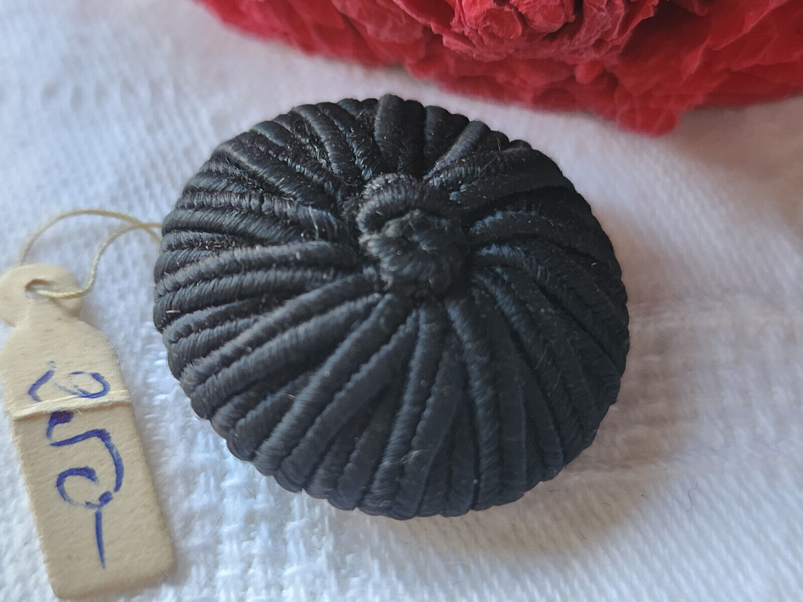 Ancien bouton en passementerie noir 2,7 cm pied D12N