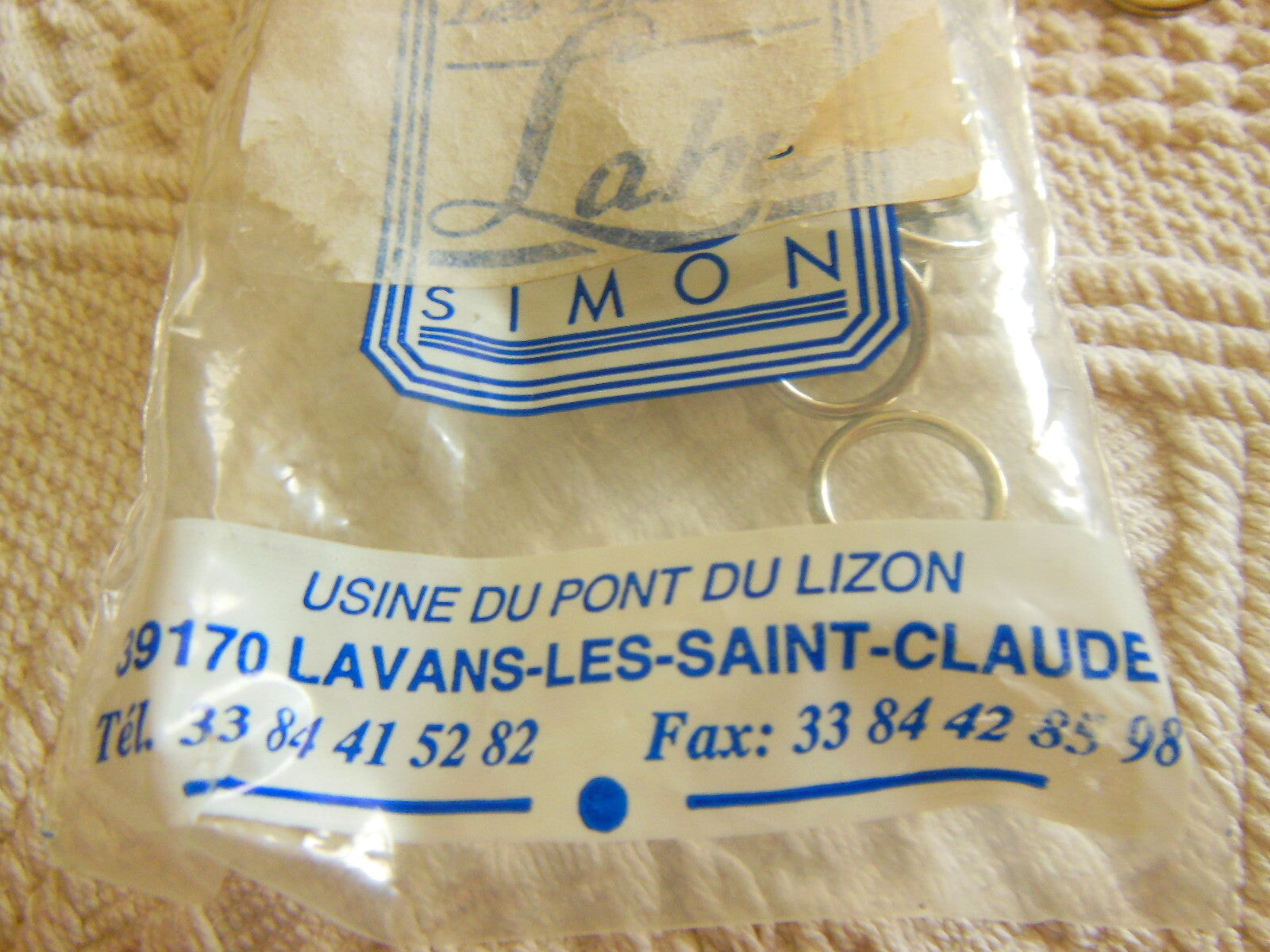 Lot 15 anneaux en métal argenté boucle fabrication française  T17
