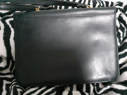 Ancien sac en main noir cuir forme classique