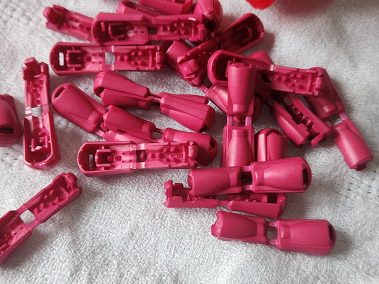 Lot 20 stop cordons rose taille fermé: 1, 4 cm ouvert 3 cm année 90 ref 5699