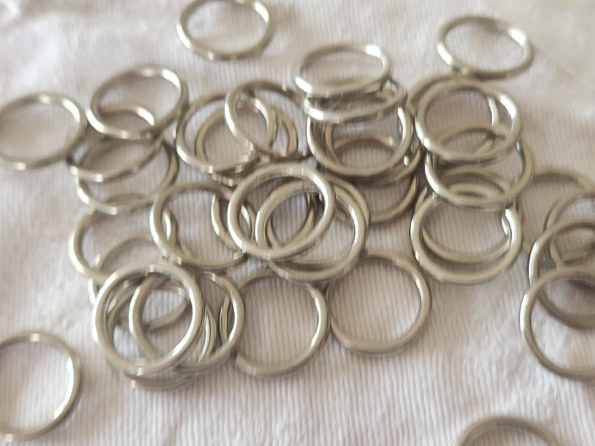 Lot 36 anneaux vintage metal argenté mercerie diamètre 1,6 cm T3