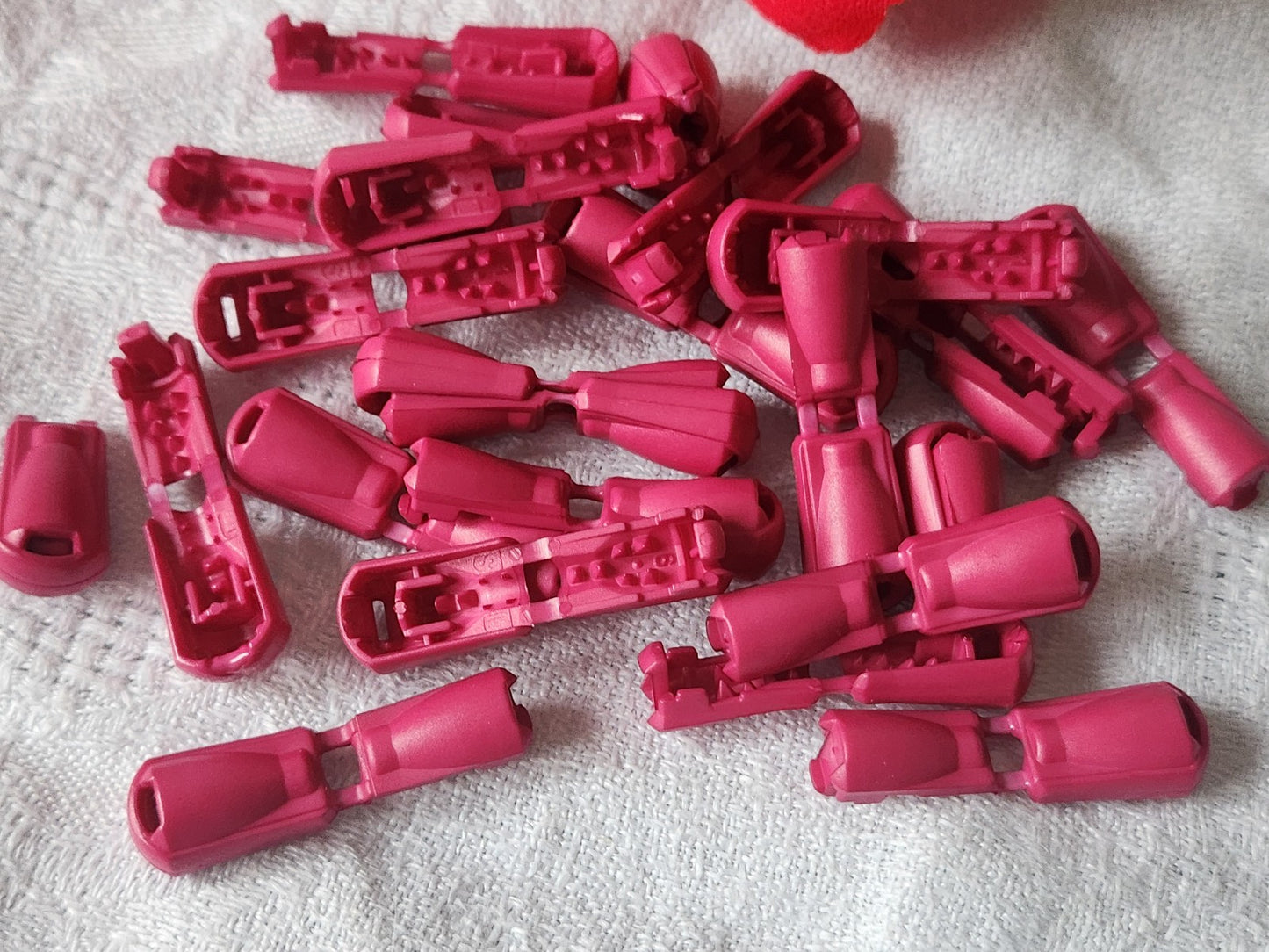 Lot 20 stop cordons rose taille fermé: 1, 4 cm ouvert 3 cm année 90 ref 5699