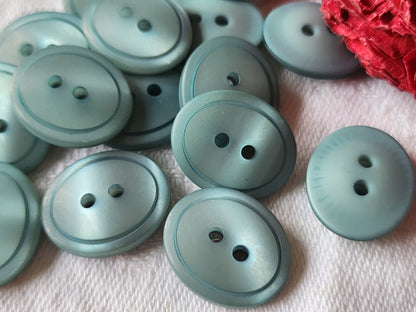 Lot 14 boutons vintage bleu ovale à trous  1,4 cm sur 1,7 cm ref 3771