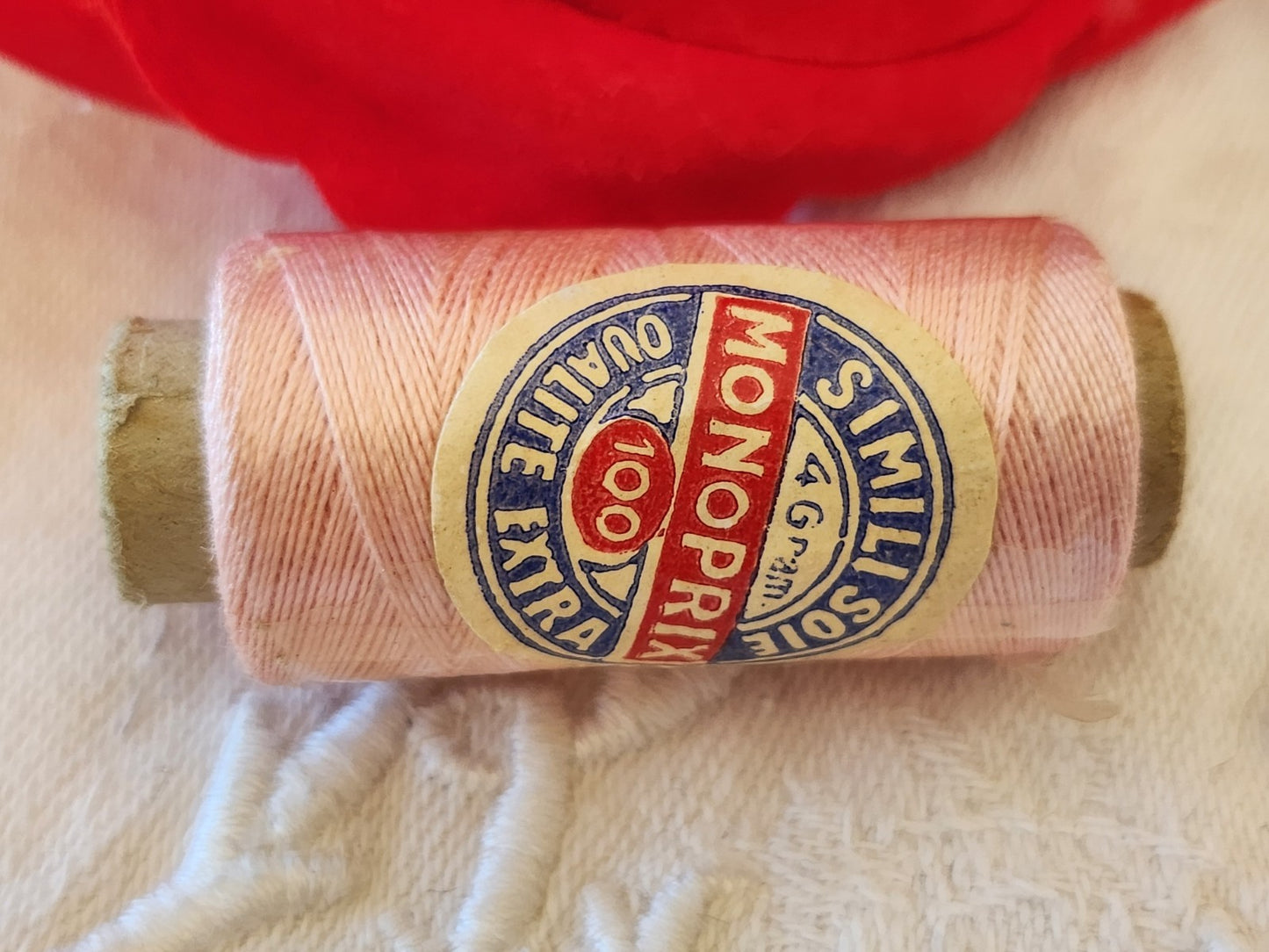 Petite bobine ancienne fil soie simili monoprix 100 qualité extra rose
