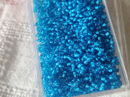 Lot environ 20 grammes de perles de rocaille bleu   n°15