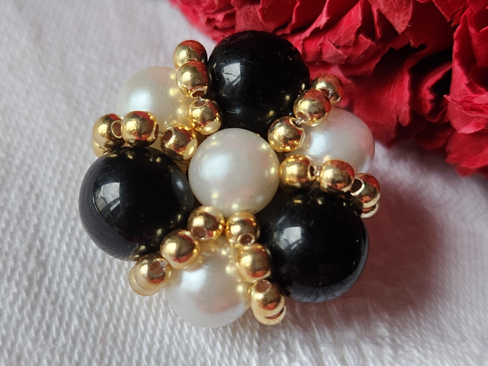 Bouton vintage  métal torsade perle en verre noir parurier  2,6 cm ref 3240
