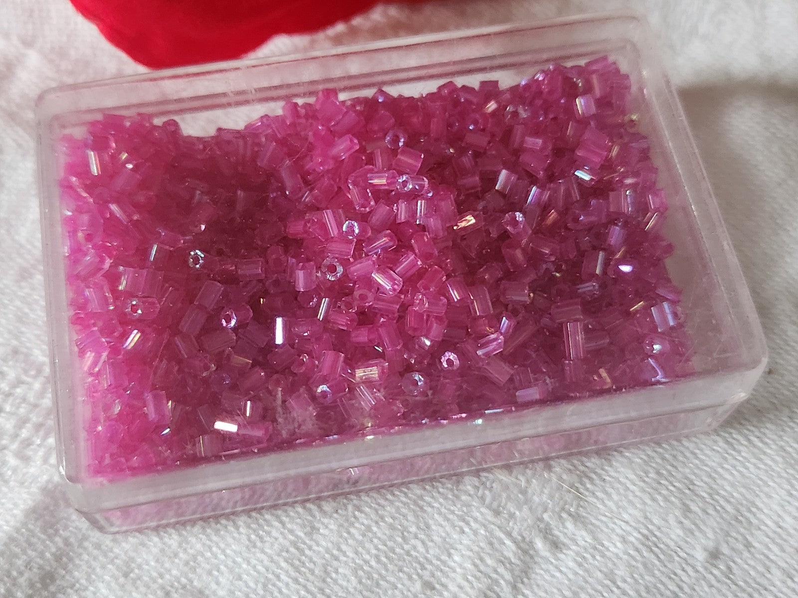 Lot environ 18 grammes de perles tube rose mordoré  n°18