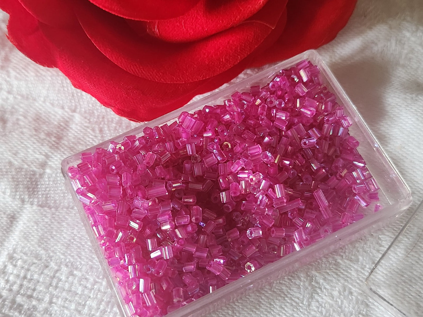Lot environ 18 grammes de perles tube rose mordoré  n°18