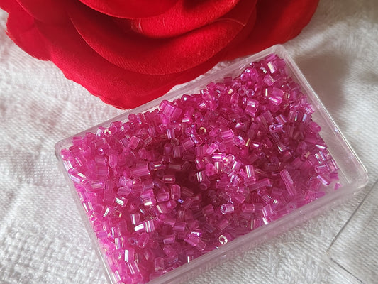 Lot environ 18 grammes de perles tube rose mordoré  n°18